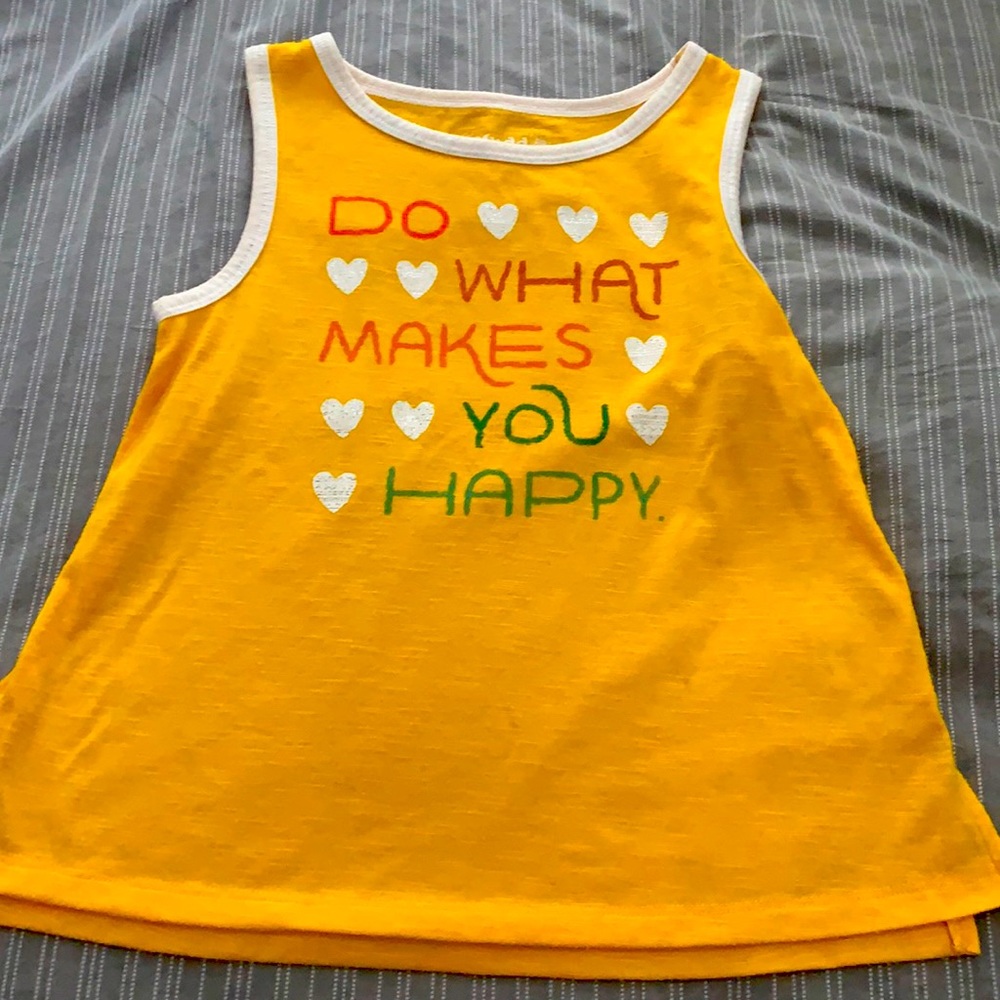 It is a 7 / 8 tank top yellow and white